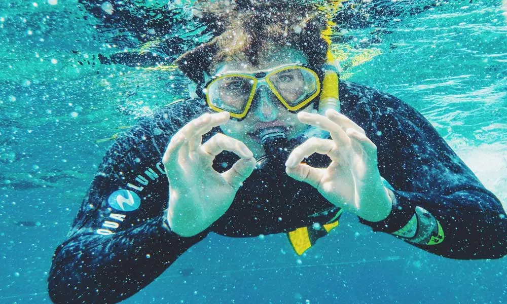 Snorkelling In Clear Waters Of Aqaba, Jordan